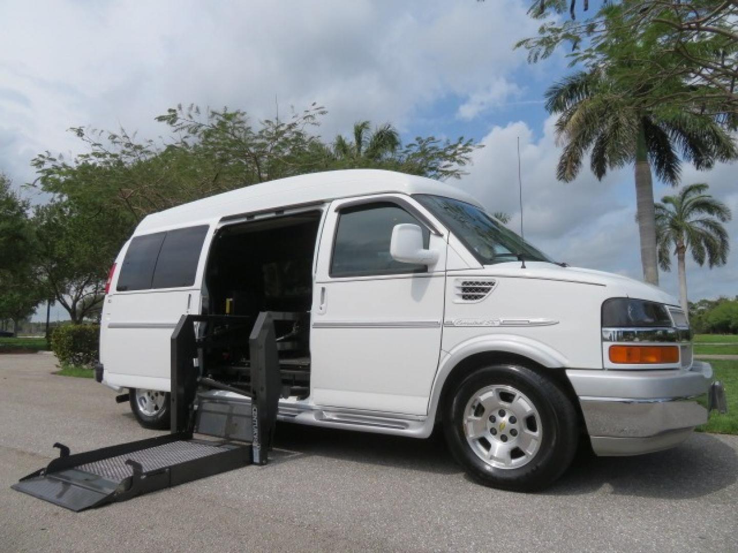 2010 White /Gray Chevrolet Express (1GNUGCD48A1) , located at 4301 Oak Circle #19, Boca Raton, FL, 33431, (954) 561-2499, 26.388861, -80.084038 - You are looking at a Gorgeous 2010 Chevy Express Handicap Wheelchair Conversion Van Explorer Limited SE with 31K Original Miles, Braun Century 750lb Side Entry Wheelchair lift, Tie Down System in the Floor, Rear Entertainment with Flat Screen TV/DVD, Leather Interior, Rear Power Folding Bench Seat/b - Photo#41